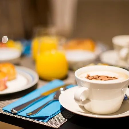 Des Voyageurs Boutique Отель Лозанна